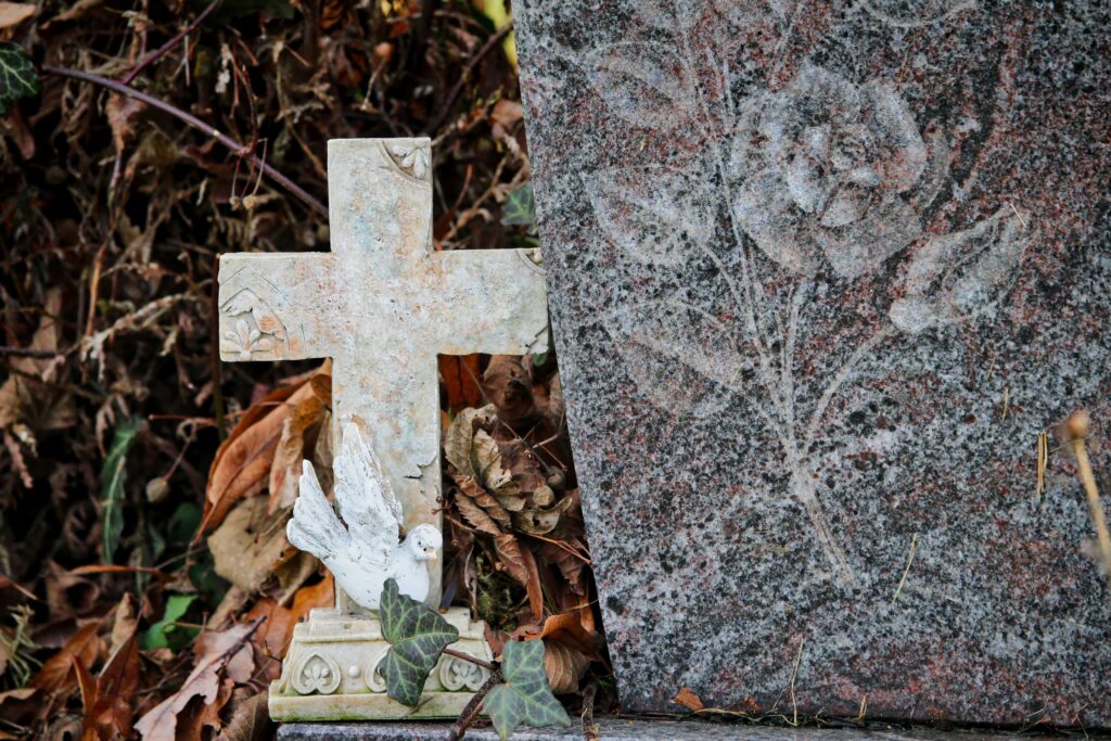 gravestone with a rose etching